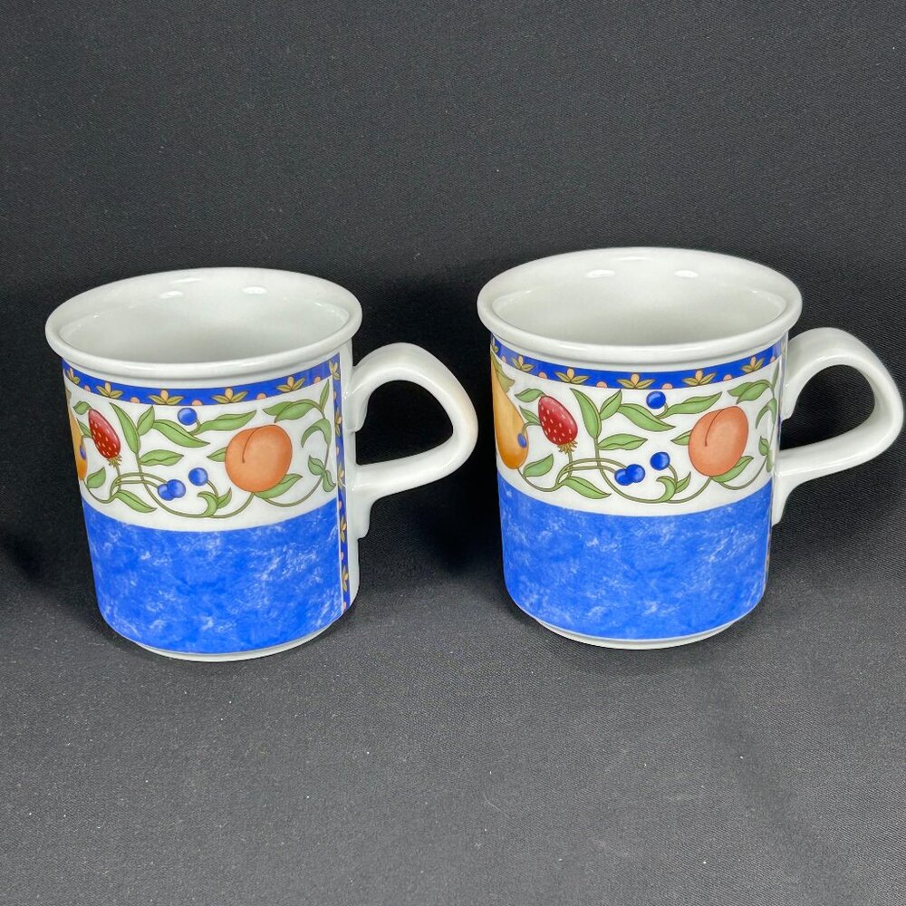 pair of colorful coffee mugs. DANSK FIANCE FRUITS